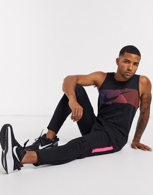 Nike Football academy joggers in black/pink