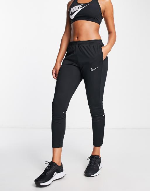 Nike football academy tapered joggers best sale in black