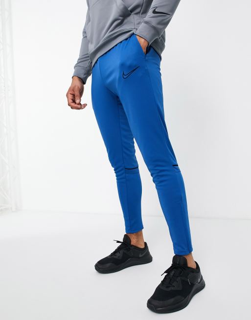 Nike Football Academy joggers in blue ASOS