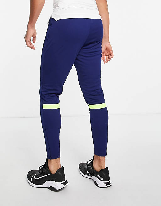 Nike Football Academy joggers in navy and volt | ASOS