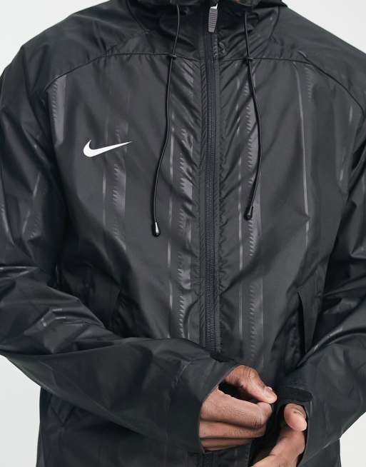 Nike football academy rain jacket hot sale in black