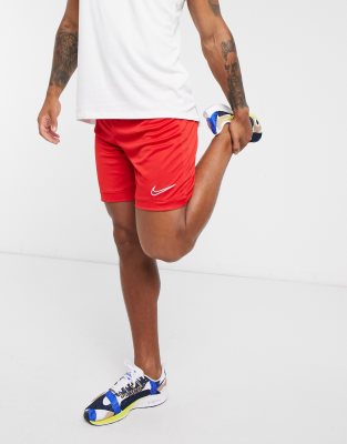 red nike football shorts