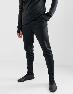 nike football academy tapered joggers in black