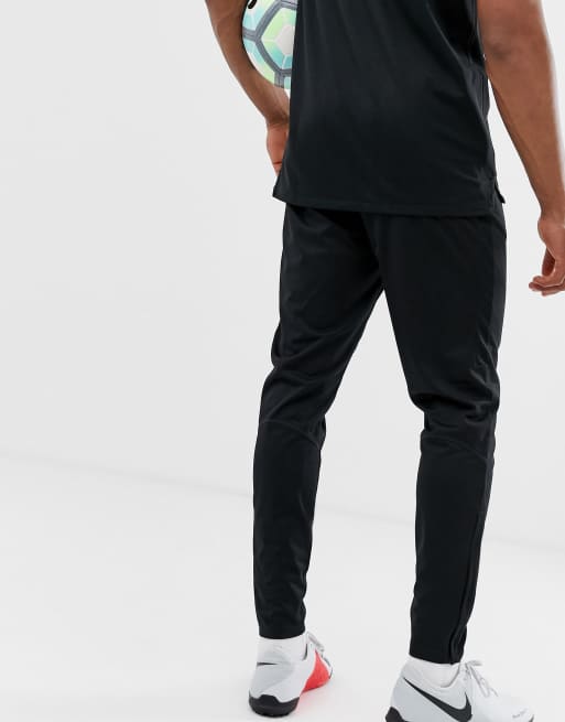 Nike football academy shop tapered joggers in black