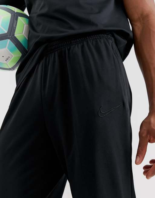 Nike football academy tapered joggers hot sale in black