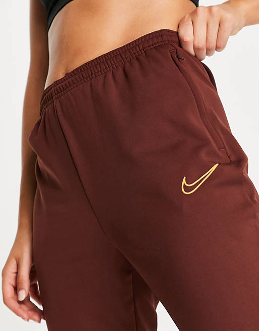Women Nike Football Academy Therma-FIT joggers in bronze 
