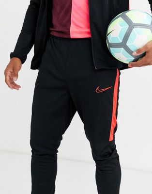 black and red nike academy tracksuit