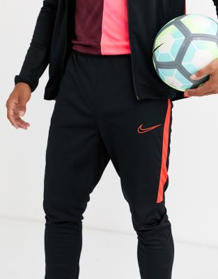 nike dri fit tracksuit black and red