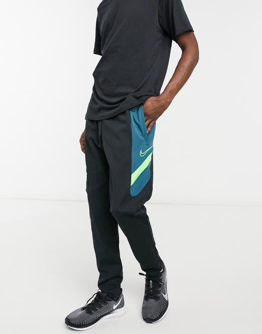 Nike Football - Academy - Trainingsbroek in zwart en neon