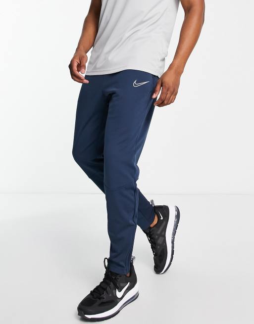 Nike Football Academy Winter Warrior Therma-FIT joggers in dark blue | ASOS