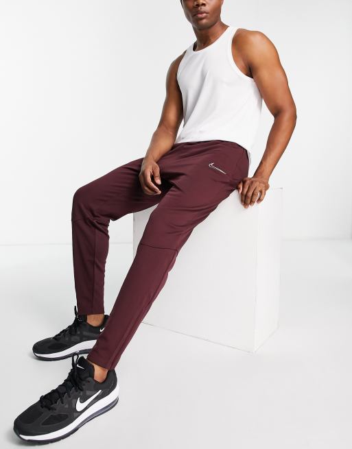 Burgundy nike best sale track pants