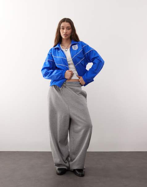 Nike Football Euro 2025 England Poly Knit full zip jacket and high waisted trousers in blue and white - view 1