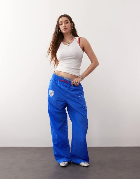 Nike Football Euro 2025 England Woven high waisted trousers in blue 