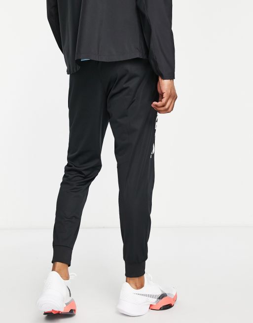 Nike libero discount woven tracksuit bottoms