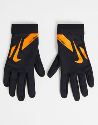 Nike Football HyperWarm Academy gloves in black and orange