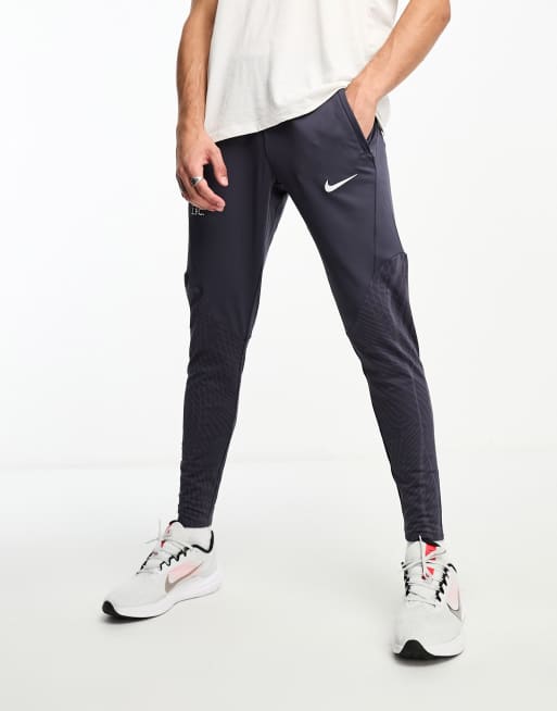 Nike Football Liverpool FC Strike Dri FIT joggers in grey