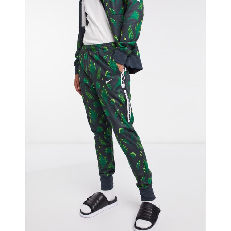 Grondig Met pensioen gaan Perfect Nike Football Nigeria track pants in green | ASOS