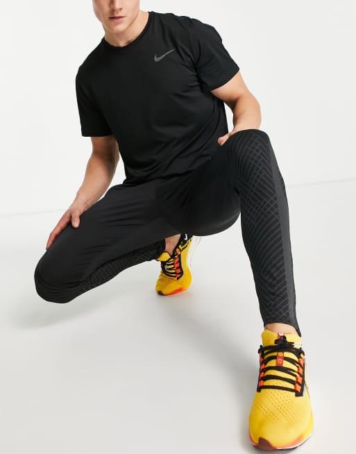 Nike football strike discount tapered joggers in black