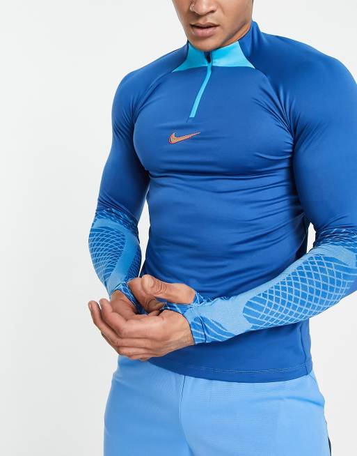 Arancel Fotoeléctrico Realista Nike Football Strike Dri-FIT long sleeve half zip in blue | ASOS