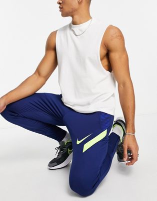 Nike Football Strike joggers in navy and volt