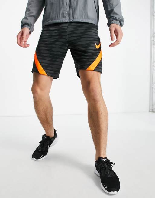 Black and store orange nike shorts