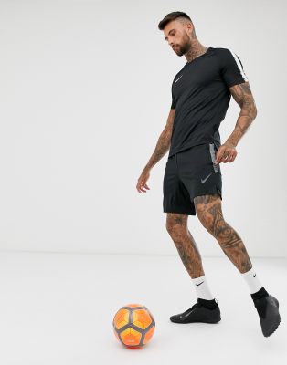 nike football shorts with zip pockets