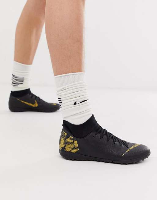 yellow nike astro turf