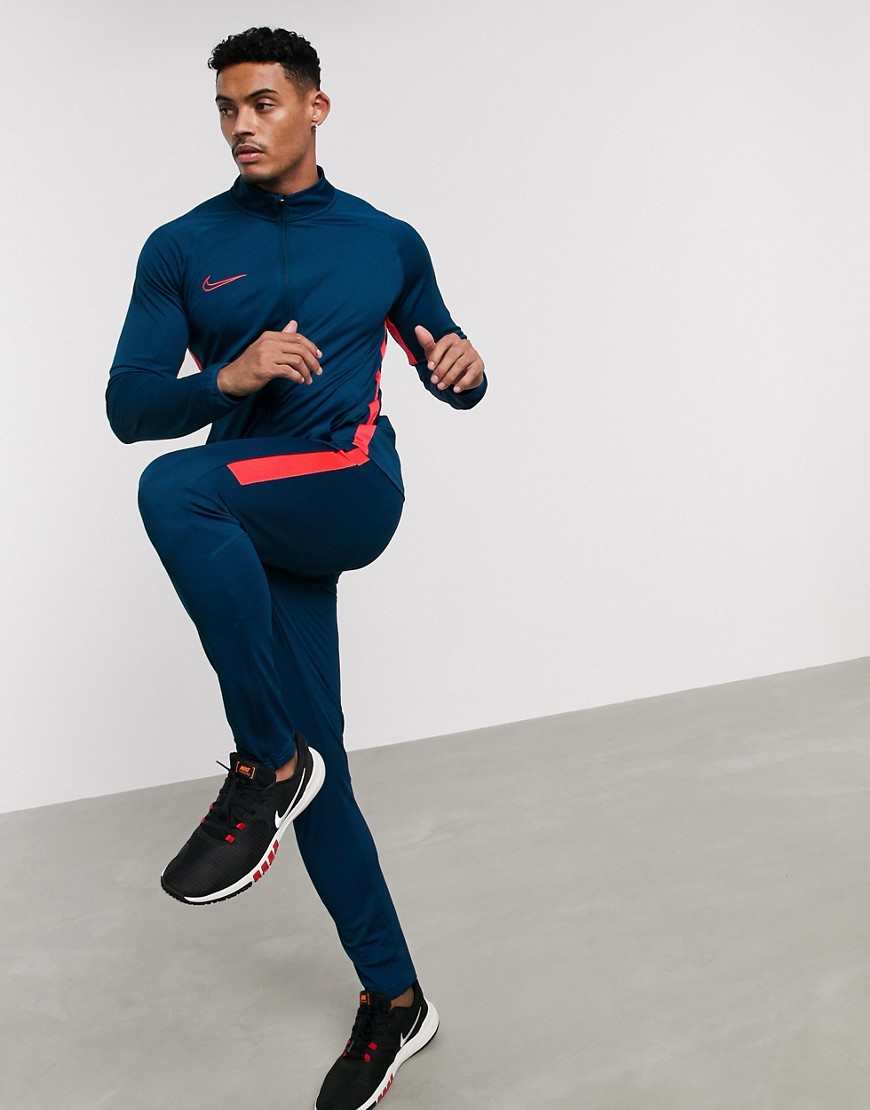Nike Football tracksuit in blue and pink