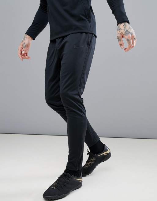 Nike football academy tapered joggers sales in black