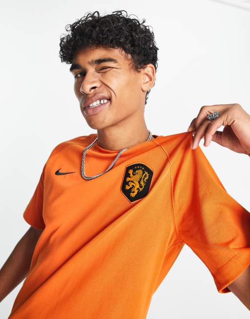 orange nike football shirt