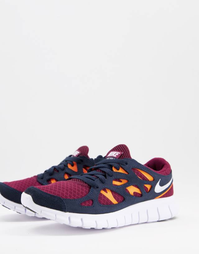 Nike Free Run 2 sneakers in dark beetroot/total orange