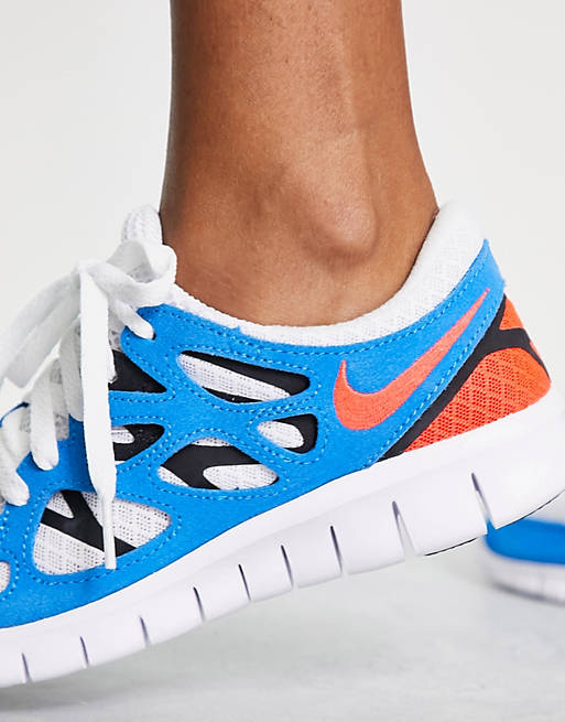 Nike Free Run 2 sneakers in white/photo blue ASOS