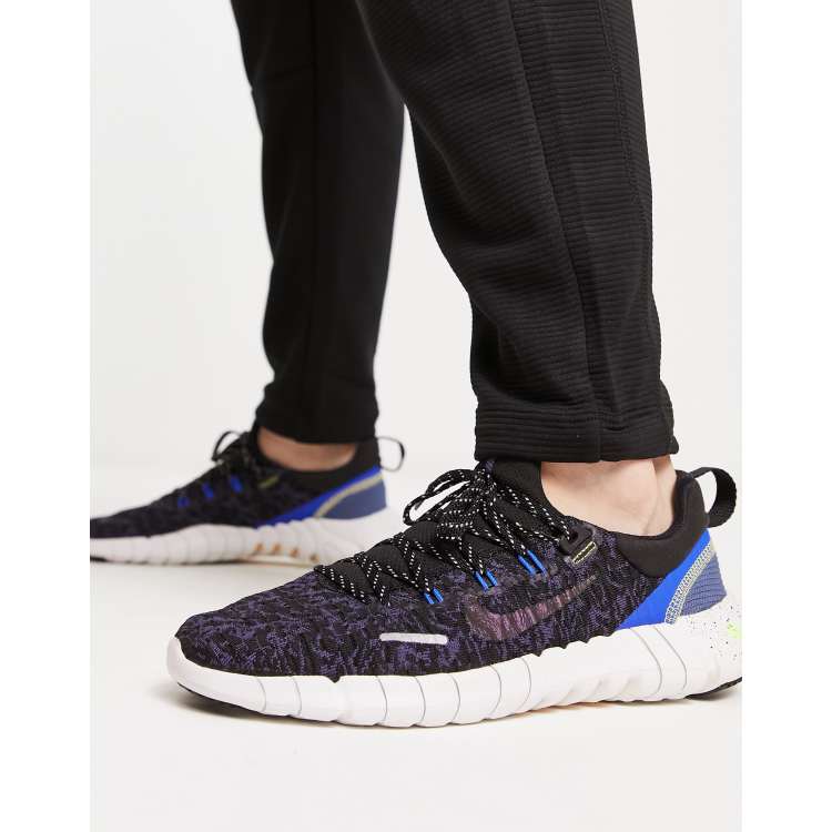 Eigen strijd probleem Nike Free Run 5.0 sneakers in black and blue | ASOS