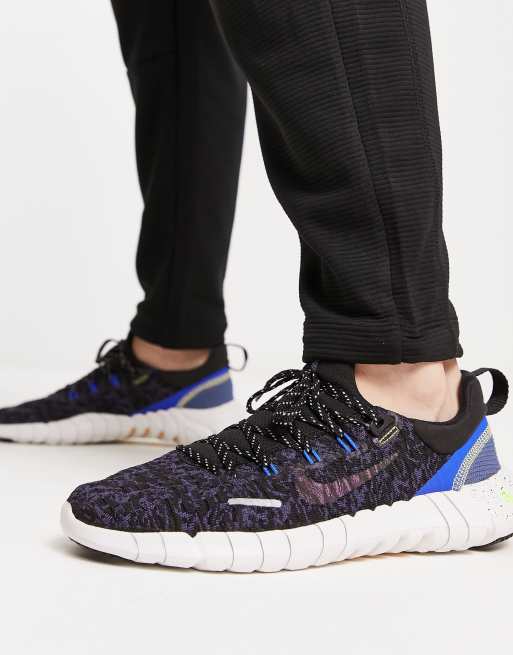 vooroordeel Streng Kenia Nike Free Run 5.0 sneakers in black and blue | ASOS