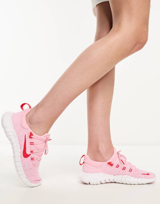 pink nike running shoes