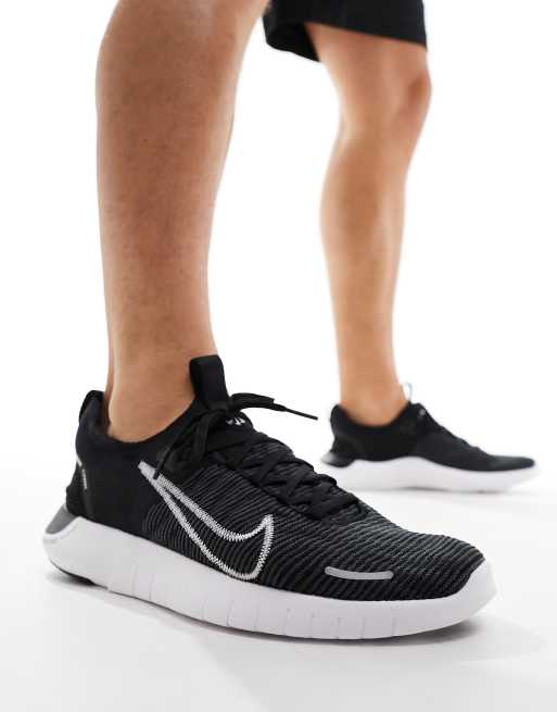 Nike Free Run Flyknit in black and white