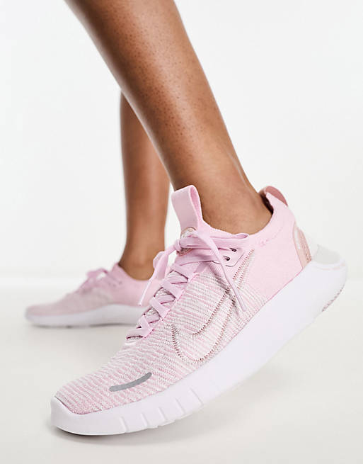 Nike Free Run Flyknit sneakers in pink