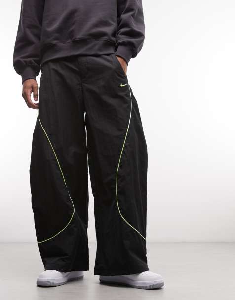 Nike F.R.O.G wide trousers in black and neon green 