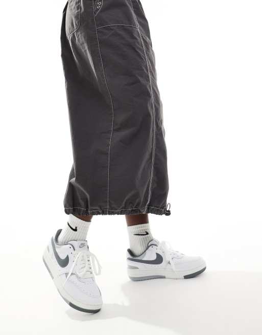 Nike Gamma Force sneakers in white and gray, 4 of 5