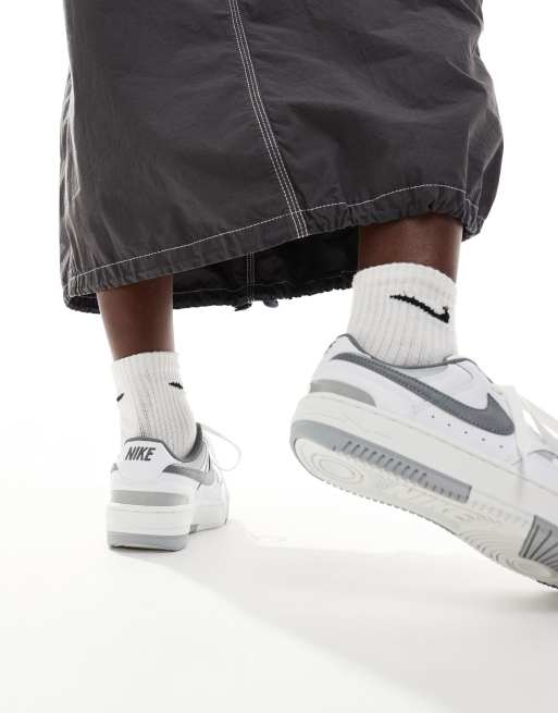 Nike Gamma Force sneakers in white and gray, 5 of 5
