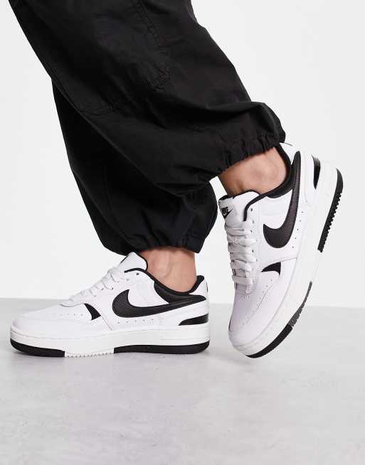 Nike Gamma Force sneakers in white & black |