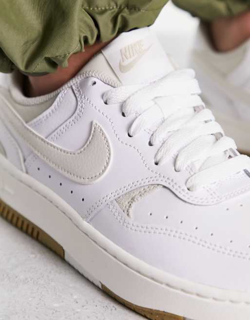 Nike Gamma Force sneakers in white 
