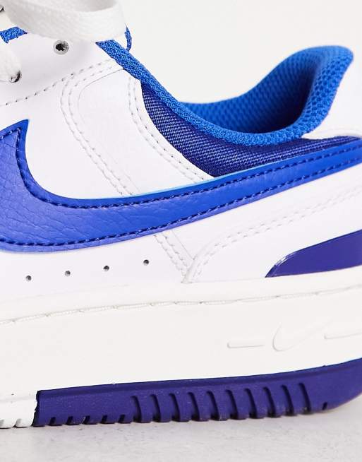 Nike Gamma Force trainers in white and game royal blue