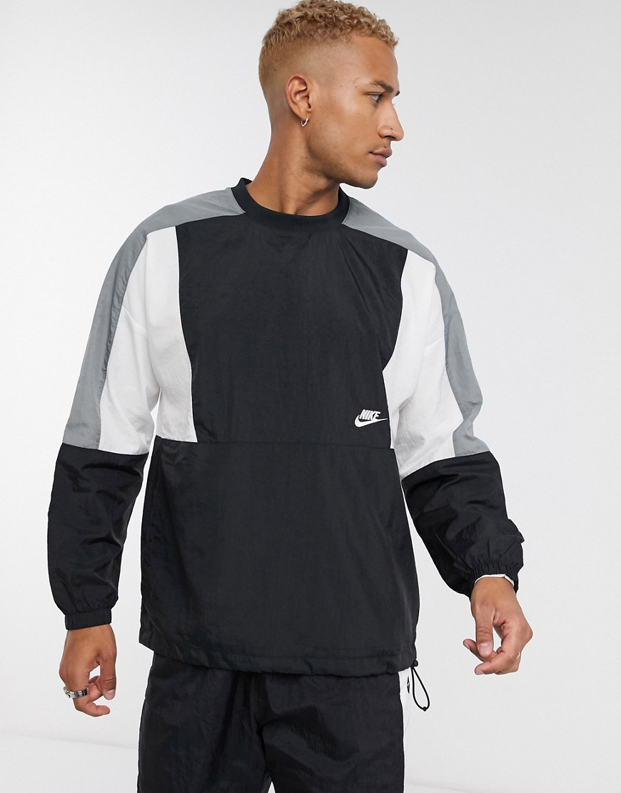 Nike - Geweven sweater met ronde hals en kleurvlakken in zwart