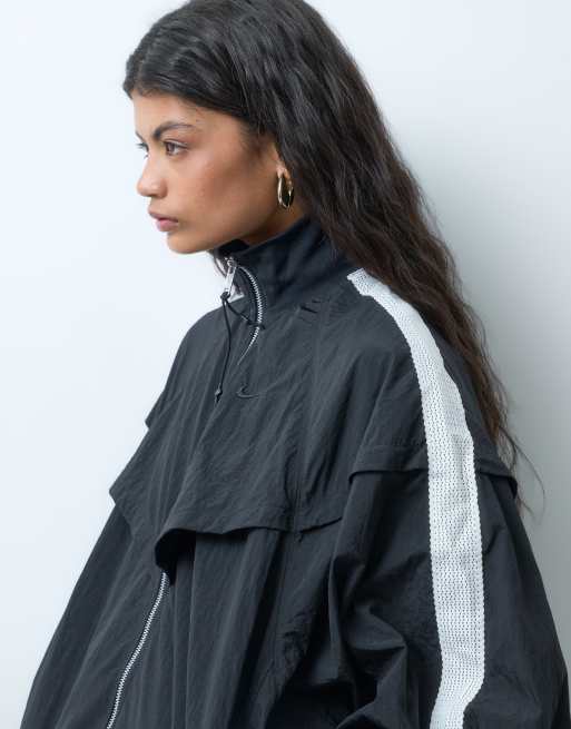 Nike giacca da tuta balloon nera e bianca, 2 di 4