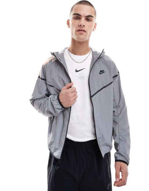 Nike - Giacca tecnica color argento riflettente con zip