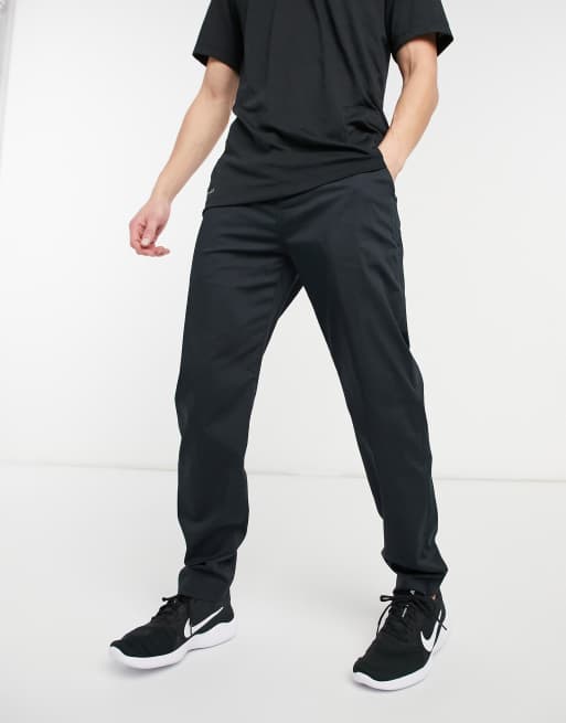 Nike – Gold – Dry – Svarta chinos med smal passform