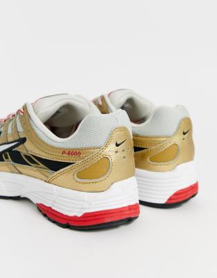 nike gold trainers