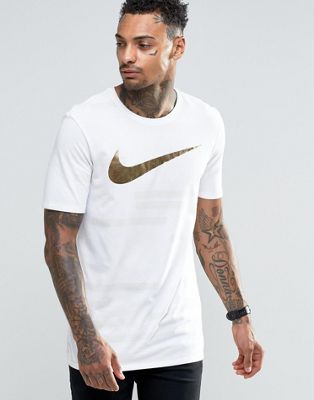 white nike shirt with gold logo