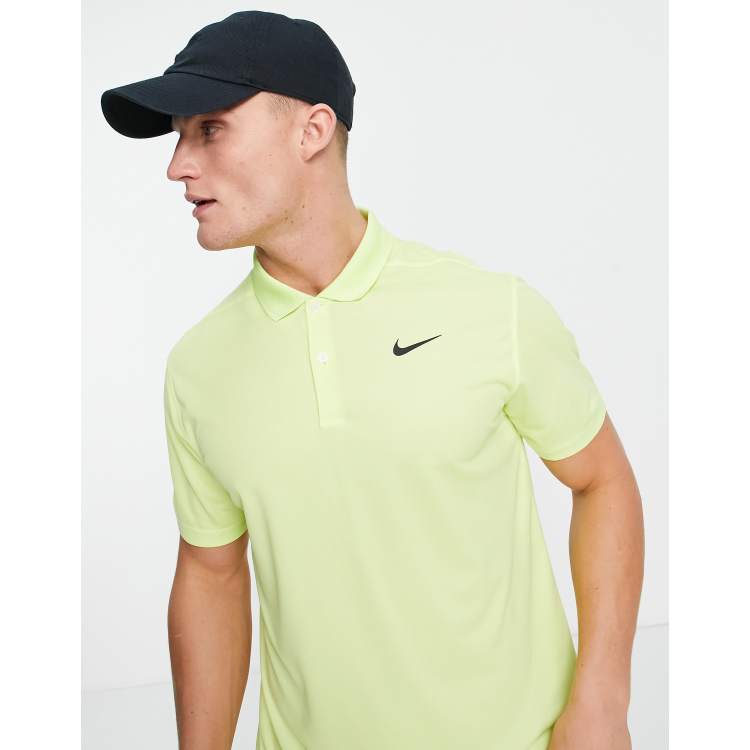 Yellow nike best sale polo shirt